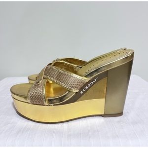 BCBG gold wedged mules.